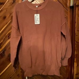 New women’s BWQ brand sweater medium